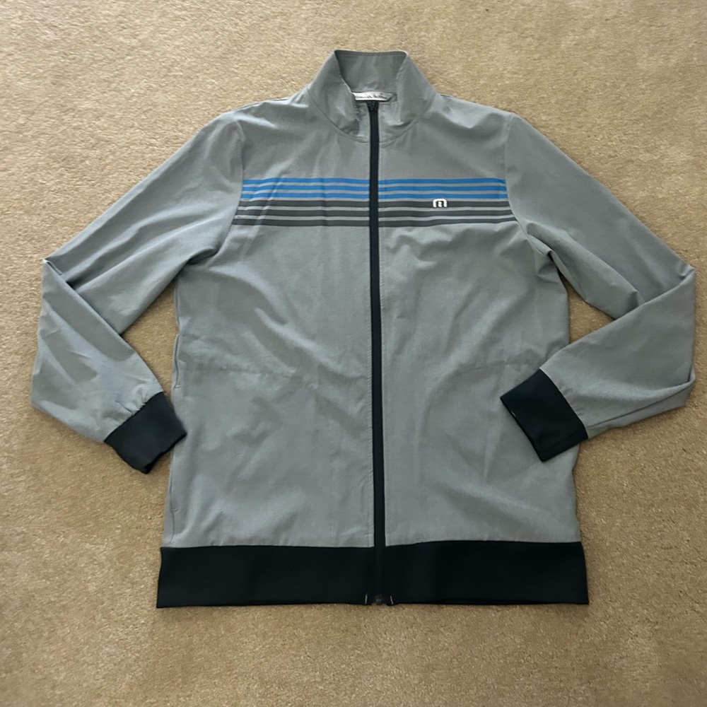 Travis Mathew Gray Jacket with Black and Blue Accents